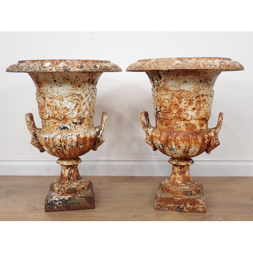 537 - A pair of white painted cast iron Campana Garden Urns in the manner of Handyside, with egg and dart ... 