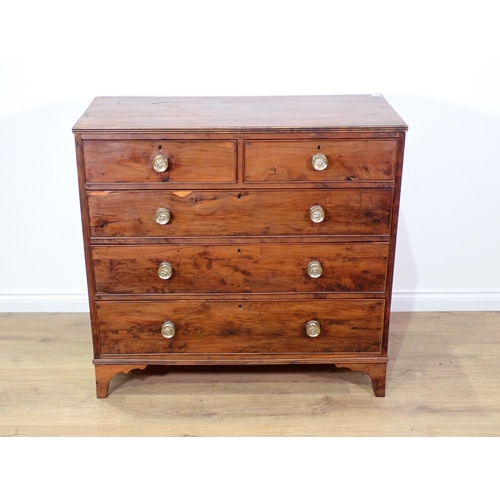 545 - A 19th Century yew wood Chest of two short and three long graduated drawers on bracket supports with... 