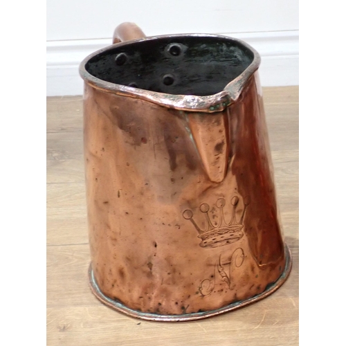 570 - A 19th Century Copper Beer Jug with a shaped tubular handle to the tapered cylindrical sides, engrav... 