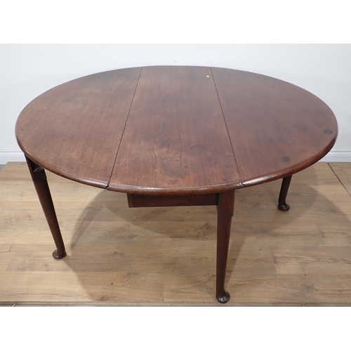 602 - An 18th Century mahogany dropleaf Dining Table mounted upon turned tapering supports and pad feet be... 