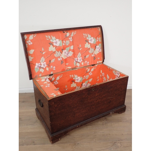 604 - A late 19th Century grain painted Blanket Box with hinged cover fitted two small drawers and a Candl... 