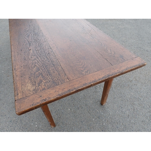 608 - An oak Farmhouse Table, the cleated 3-board top raised on square tapered legs, 7ft 4in L, 2ft 8in W