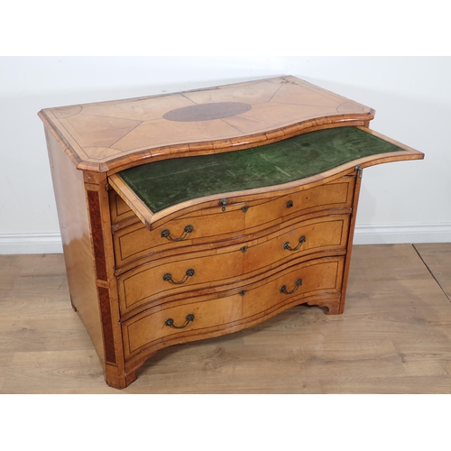 610 - A satinwood serpentine Chest in the George III style fitted brushing slide with Greek key frieze abo... 