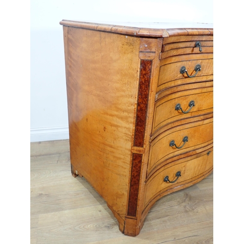 610 - A satinwood serpentine Chest in the George III style fitted brushing slide with Greek key frieze abo... 