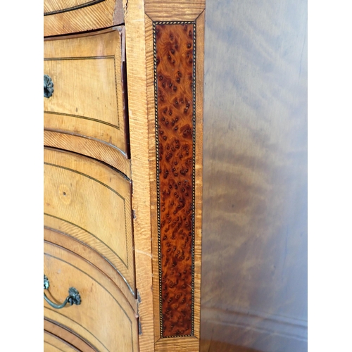 610 - A satinwood serpentine Chest in the George III style fitted brushing slide with Greek key frieze abo... 