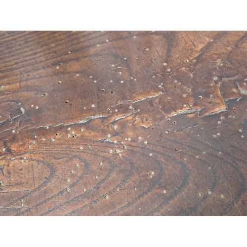 615 - An early 19th Century yew and elm Windsor Elbow Chair with pierced splat back, on turned supports an... 