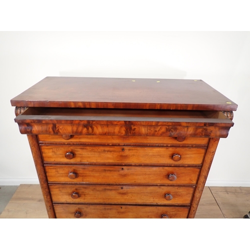 617 - A large 19th Century mahogany Chest with cushion drawer above five long drawers flanked by half roun... 