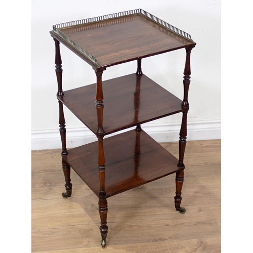 619 - An early 19th Century rosewood three tier Etagere with pierced brass gallery with turned supports an... 