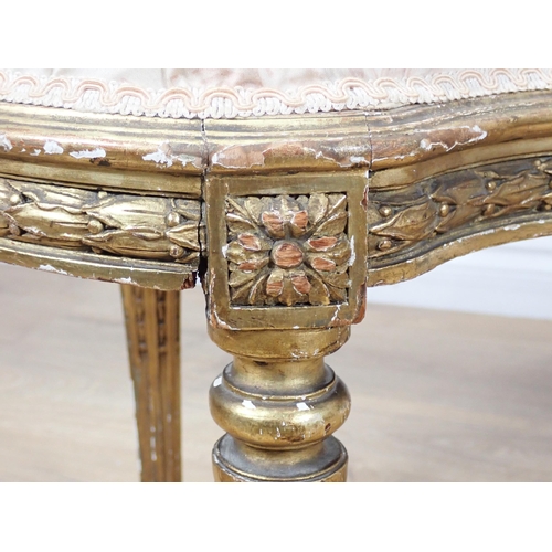 620 - A French style Occasional Seat with carved leafage and scroll design frame on fluted turned supports... 