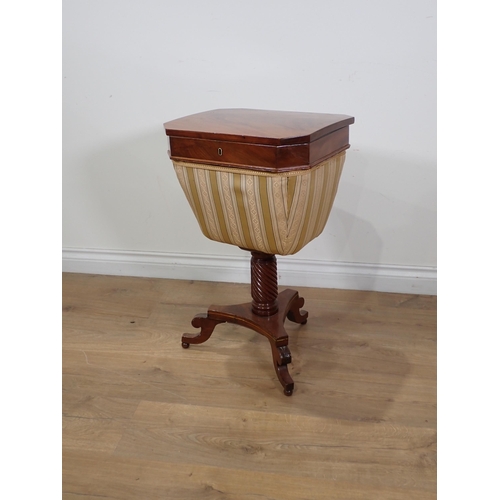 624 - A 19th Century mahogany Sewing Table with hinged top on spiral turned column and triform base