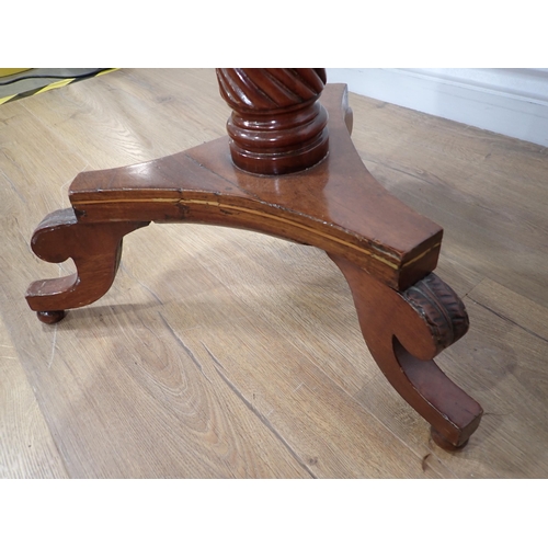 624 - A 19th Century mahogany Sewing Table with hinged top on spiral turned column and triform base