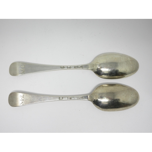 63 - A pair of George II silver bottom marked Table Spoons, Hanoverian pattern, engraved initials M and E... 