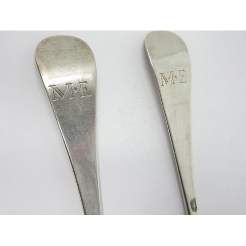 63 - A pair of George II silver bottom marked Table Spoons, Hanoverian pattern, engraved initials M and E... 