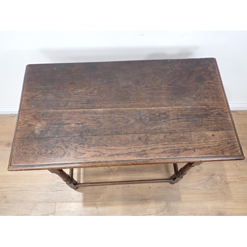 634 - An 18th Century oak Side Table with moulded top, fitted frieze drawer on turned and squared supports... 