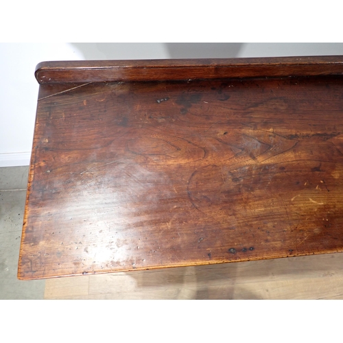 650 - An 18th Century fruitwood Dresser Base fitted with three mahogany crossbanded drawers above Cupid's ... 