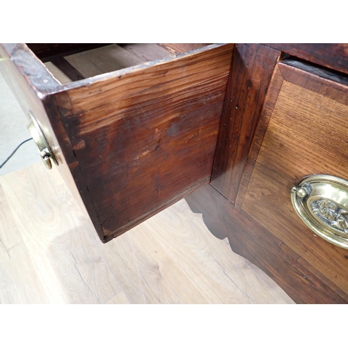 650 - An 18th Century fruitwood Dresser Base fitted with three mahogany crossbanded drawers above Cupid's ... 