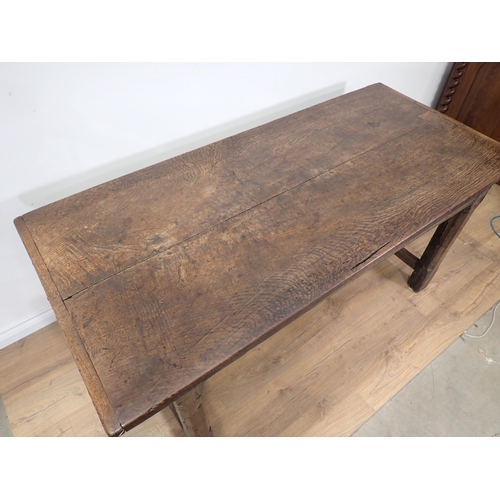 651 - An antique oak small Refectory Table with cleated thick two-plank top on chamfered square legs unite... 