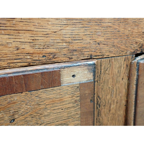 652 - A 19th Century oak Lancashire Chest with crossbanded hinged top above two dummy drawers above one lo... 