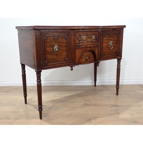 653 - An early 19th Century mahogany bowfront Sideboard fitted pair of drawers flanked by deep drawer and ... 