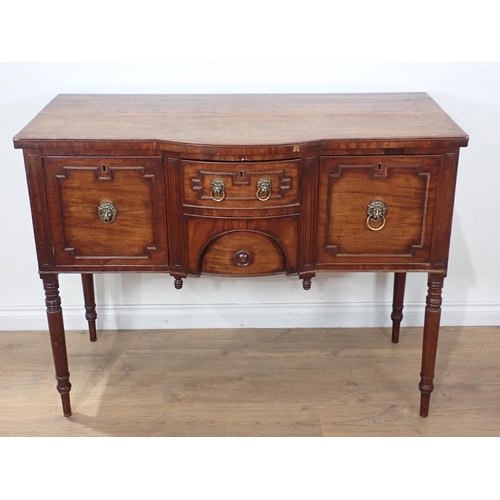 653 - An early 19th Century mahogany bowfront Sideboard fitted pair of drawers flanked by deep drawer and ... 