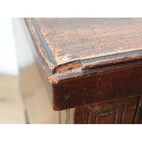 653 - An early 19th Century mahogany bowfront Sideboard fitted pair of drawers flanked by deep drawer and ... 