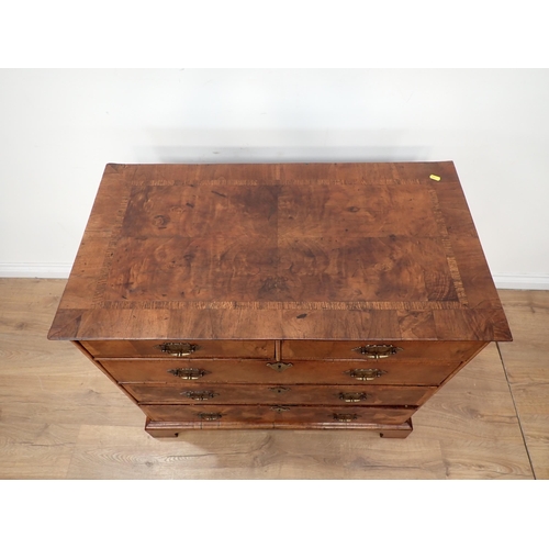 655 - An 18th Century walnut Chest of Drawers, the double crossbanded quartered top above 2 short and thre... 