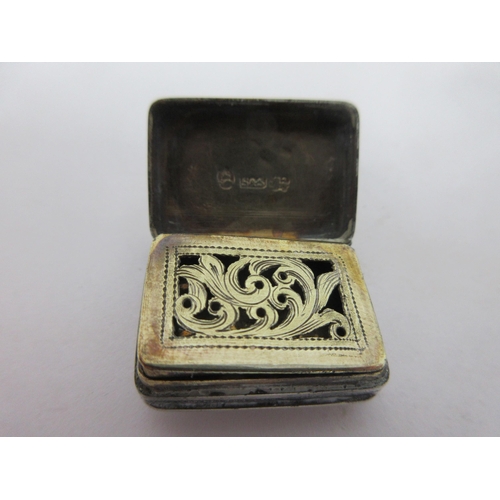 67 - A George III silver Vinaigrette with leafage engraving and vacant cartouche, scroll pierced grille, ... 