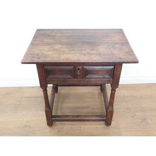 671 - A late 17th Century oak Side Table with moulded frieze drawer on turned and square legs united by sq... 