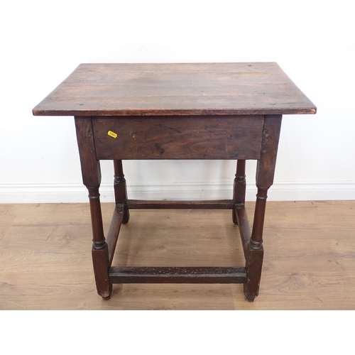 671 - A late 17th Century oak Side Table with moulded frieze drawer on turned and square legs united by sq... 