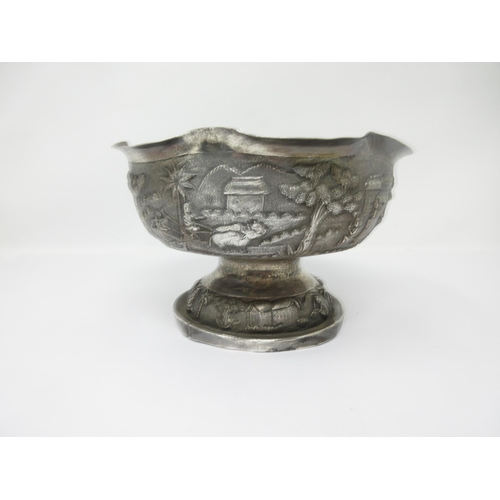 68 - An Indian silver Bowl finely embossed and chased with figures and animals in landscape friezes 
7in ... 