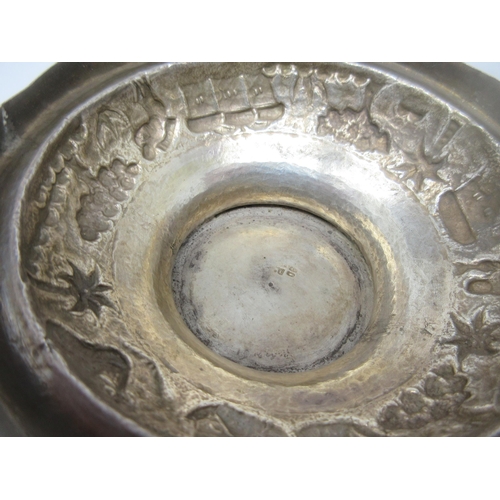 68 - An Indian silver Bowl finely embossed and chased with figures and animals in landscape friezes 
7in ... 