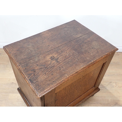 681 - A late 17th Century oak and elm Cupboard with single solid panelled door enclosing three drawers on ... 