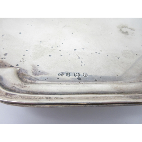 69 - A George V silver shaped square Salver on four hoof feet, Birmingham 1932, 680 gms