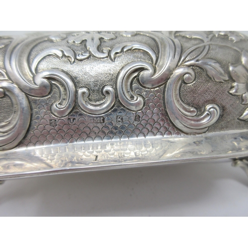 81 - A George III Scottish silver Entree Dish and Cover with later floral embossing, engraved crest and m... 