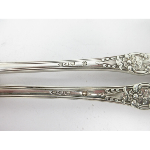 83 - A pair of Victorian silver Basting Spoons, Queen's pattern, engraved crest, London 1894, maker: J.A.... 