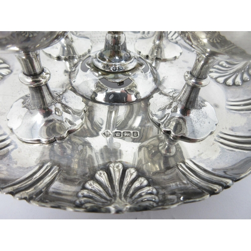 94 - A Victorian silver four Egg Cup Stand with central handle, engraved inscription, Sheffield 1899, 520... 