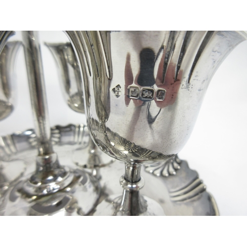 94 - A Victorian silver four Egg Cup Stand with central handle, engraved inscription, Sheffield 1899, 520... 