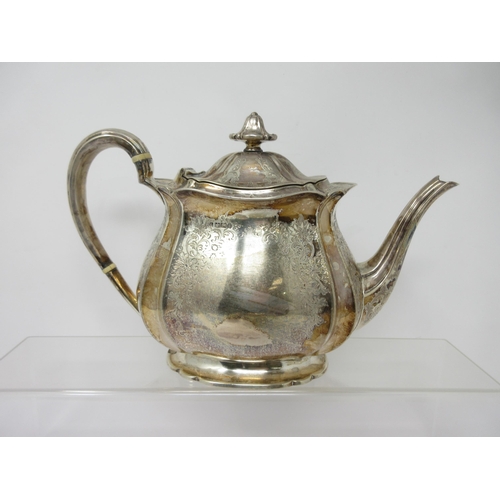 97 - A Victorian silver three piece Tea Service of bulbous form engraved flowers and leafage scrolls, She... 