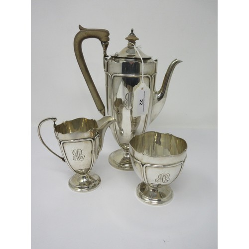 22 - A George V silver three piece Coffee Service with tubed design, engraved initials, Birmingham 1912-1... 