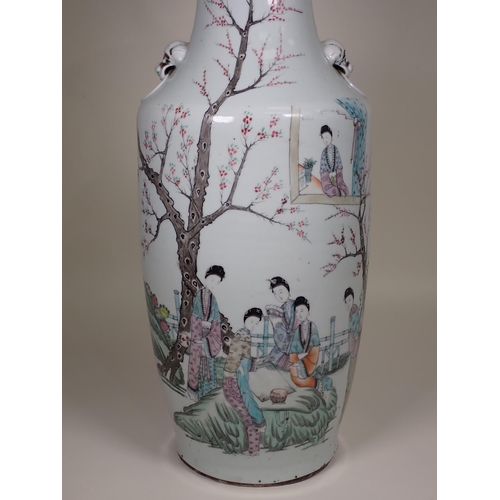 368 - A famille rose baluster Vase with head and ring moulded handles, decorated with figures in a landsca... 