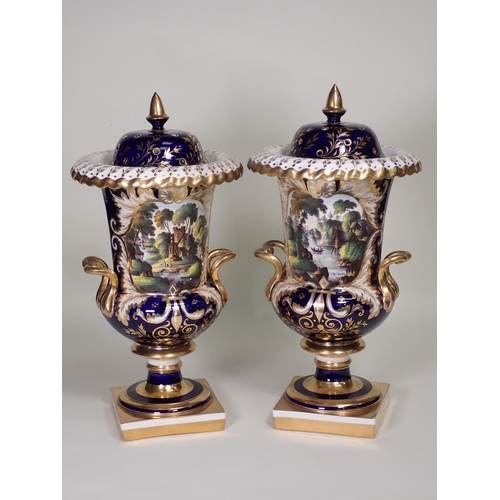 372 - A pair of Spode urn shaped two-handled Vases, decorated panels of landscapes with figures, sailing b... 