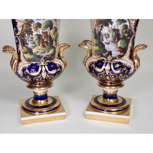 372 - A pair of Spode urn shaped two-handled Vases, decorated panels of landscapes with figures, sailing b... 