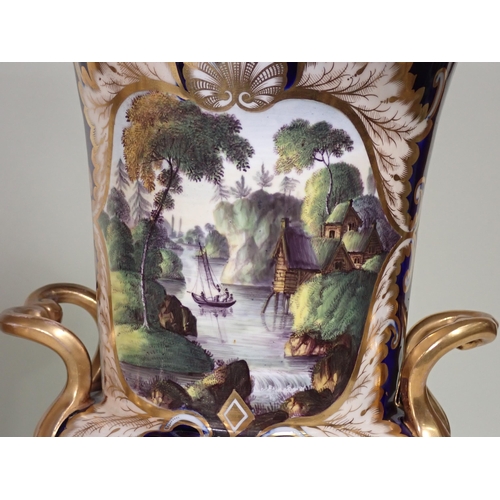 372 - A pair of Spode urn shaped two-handled Vases, decorated panels of landscapes with figures, sailing b... 