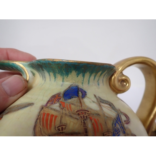 374 - A Crown Devon Jug with painted boat scene, gilt scroll handle, a small Moorcroft baluster Vase with ... 