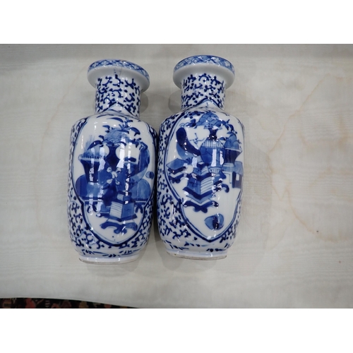 425 - A collection of 19th Century Chinese blue and white Vases, including a pair with panels of vases, 7½... 