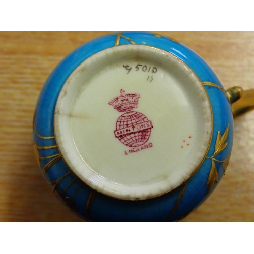 349 - A pair of Minton porcelain Cups and Saucers painted pink roses with gilt border, a Minton Coffee Cup... 