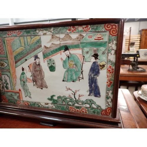 432 - A Chinese porcelain rectangular Panel or Block painted two seated Figures with attendants in famille... 