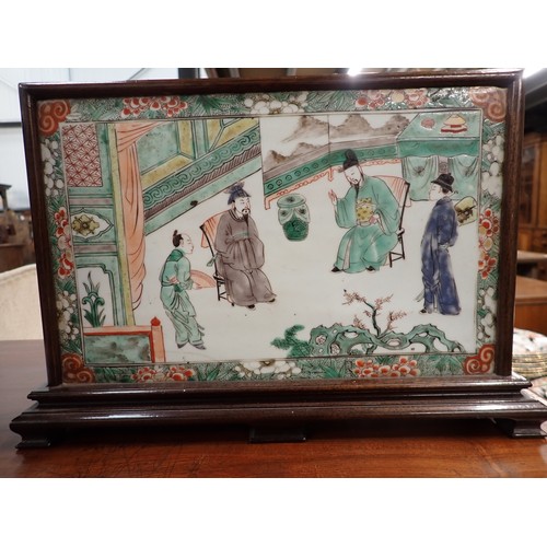 432 - A Chinese porcelain rectangular Panel or Block painted two seated Figures with attendants in famille... 