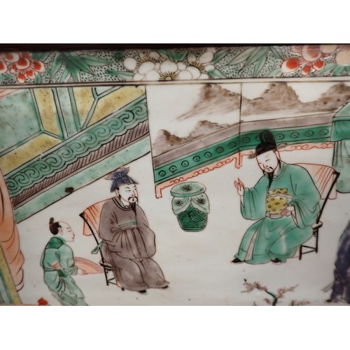 432 - A Chinese porcelain rectangular Panel or Block painted two seated Figures with attendants in famille... 