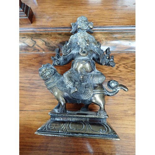 478 - An Eastern bronze Figure of Ganesh, seated on a large Indian bandicoot, 7in H and an Eastern bronze ... 